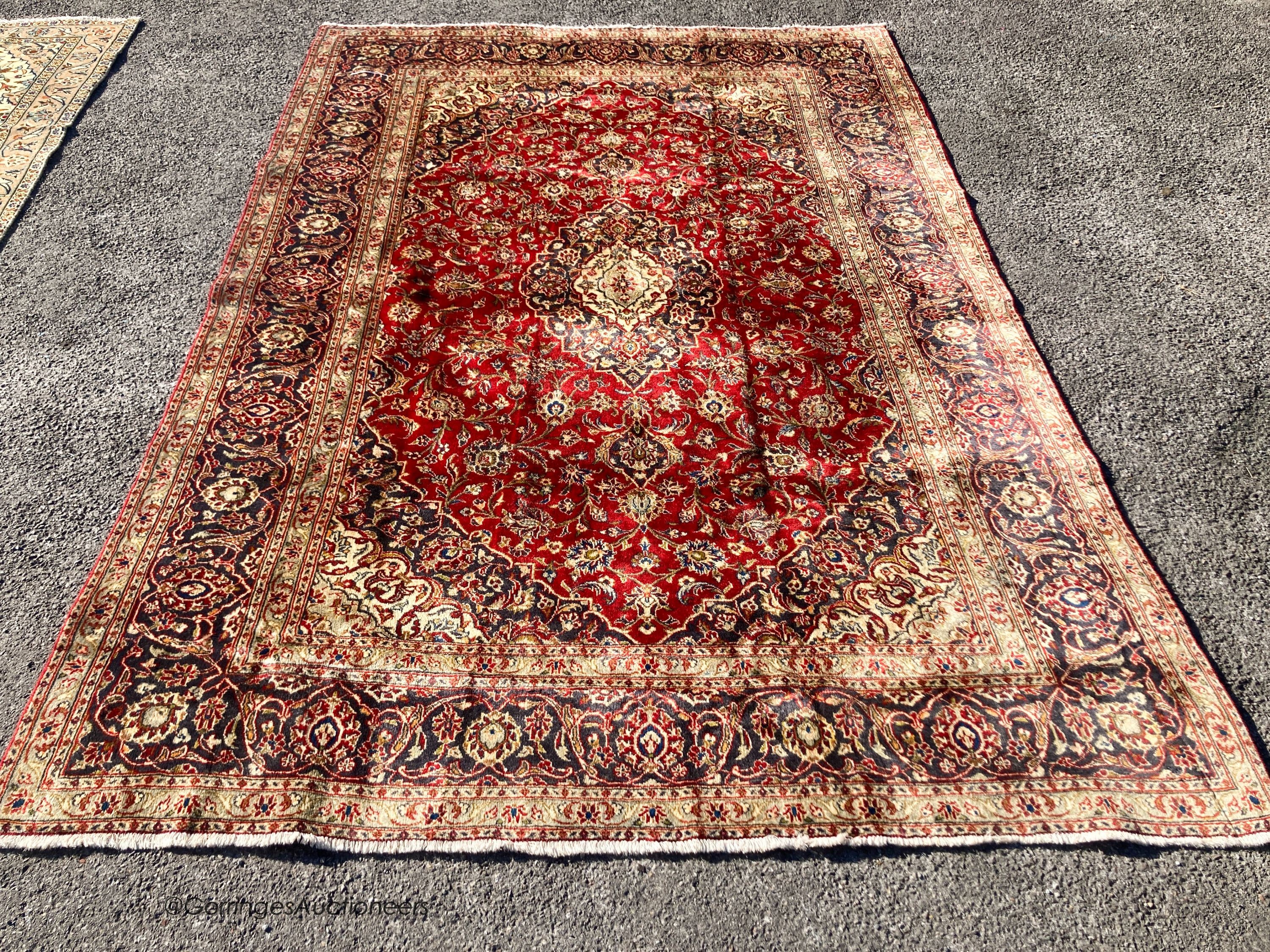 A Kashan carpet, 300 x 198cm
